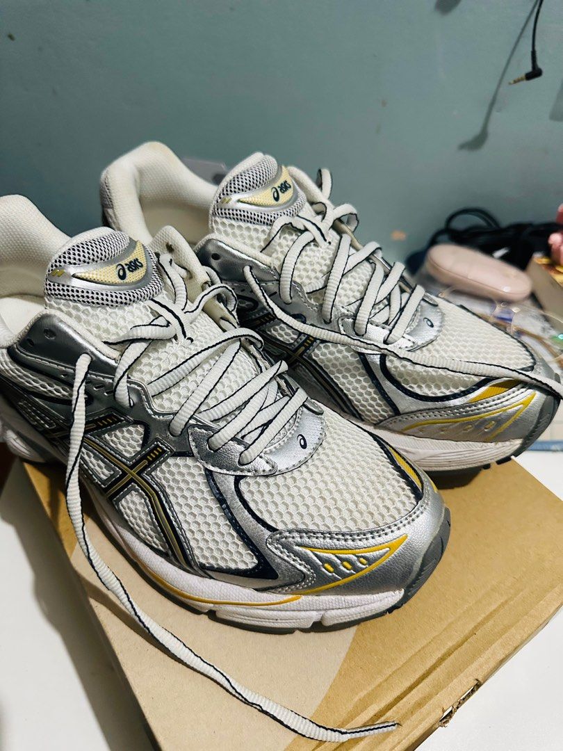 Asics GT-2150 Running Shoes (Category: Sneakers) located in Paranaque City. Submitted by pumpkinhead25 (Listing ID 1409019994, Image 1). Description: - Asics GT-2160 running shoes - Color: White, silver, and yellow - Features the Asics logo - Mesh upper - Lace-up closure - Signs of wear on soles No issue Used once sa mall Still brandnew condition Free shipping Free shipping Free shipping.