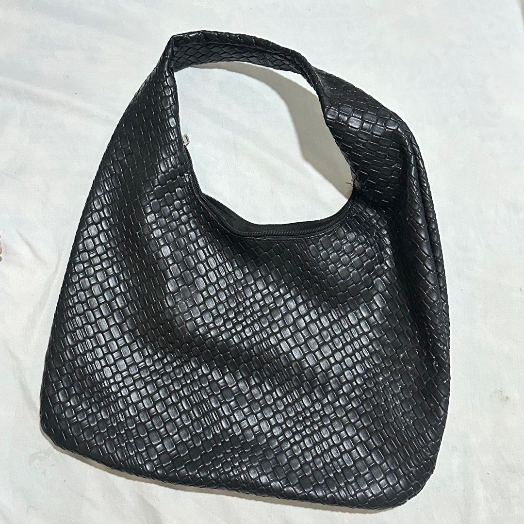 Black Faux Leather Woven Bag (Category: Shoulder Bags) located in Dasmarinas. Submitted by beadancel (Listing ID 1409045447, Image 1). Description: • Fits an iPad (when carrying light) • Faux leather / rubber material • Working zipper RFS: Decluttering.