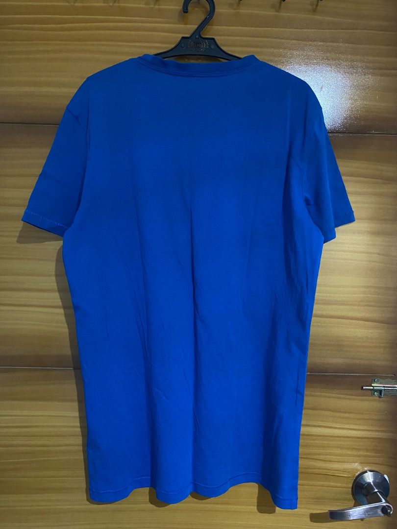 Calvin Klein Jeans Blue T-shirt (Category: Shirts) located in San Fernando. Submitted by love.declutter2 (Listing ID 1408964518, Image 3). Description: - Calvin Klein Jeans T-shirt - Orig - no flaws.