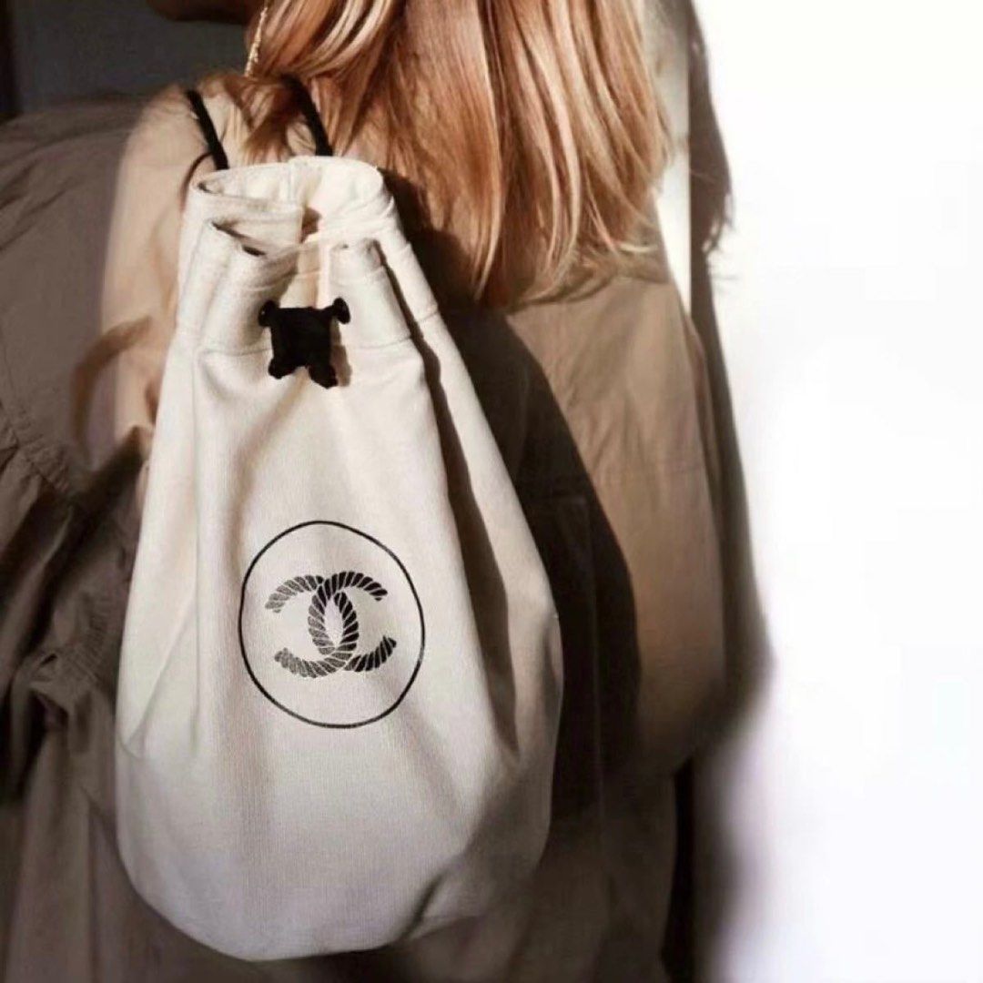 CHANEL NOVELTY DRAWSTRING BAG (Category: Luxury Bags & Wallets) located in Cavite. Submitted by second_story_ph (Listing ID 1409012020, Image 3). Description: CHANEL NOVELTY DRAWSTRING BAG STURDY POUCH OFFWHITE in great condition no issue good for daily use Authentic! DM📥.