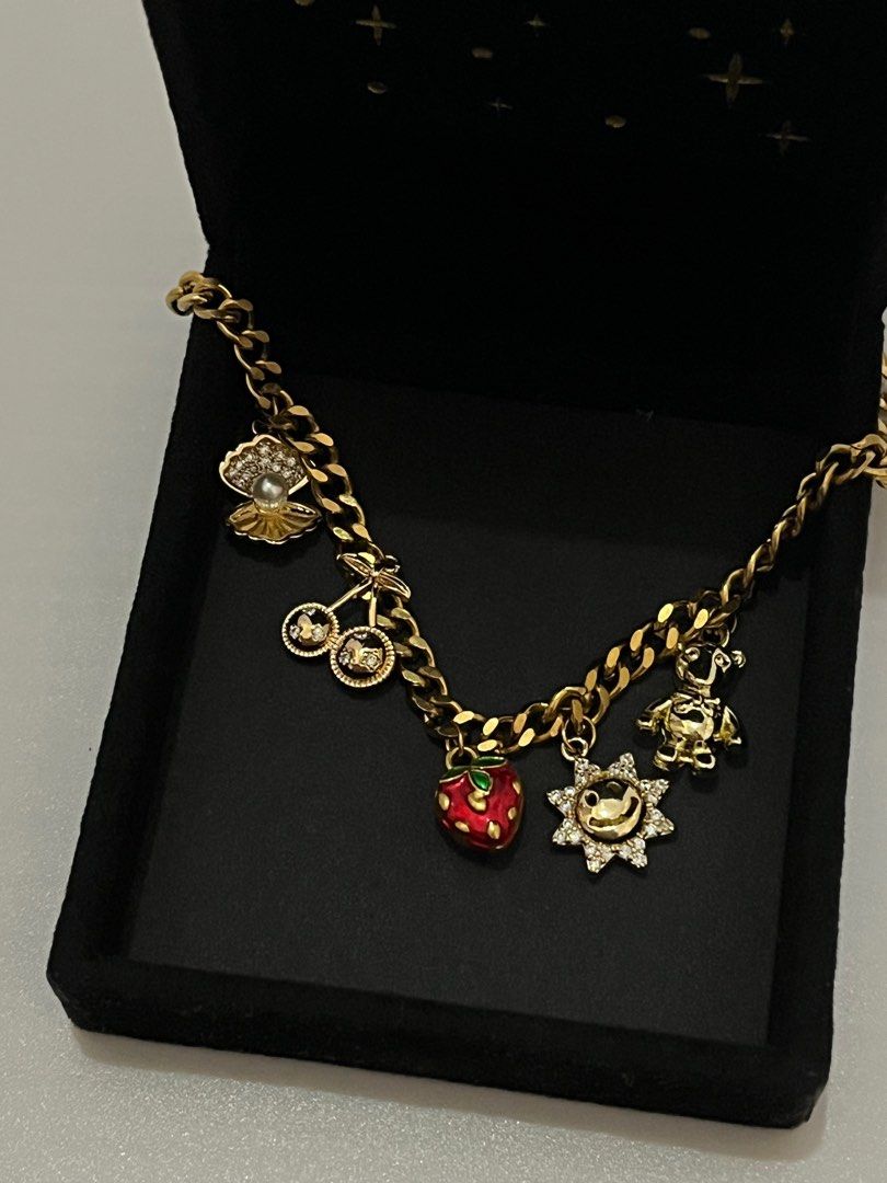 Charm Necklace Fashion (Category: Necklaces) located in Bacoor. Submitted by mayasells (Listing ID 1408924830, Image 2). Description: GARAGE SALE! - Good as new - 5 charms.