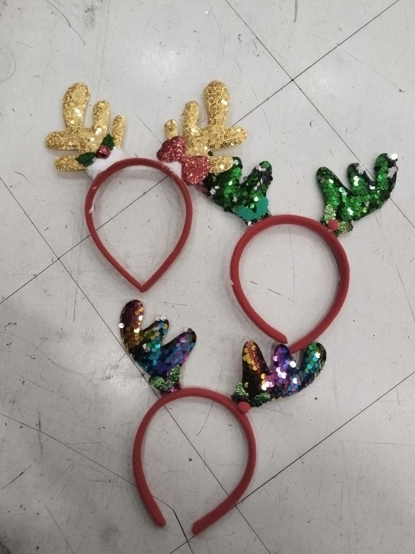 Christmas Reindeer Antler Headbands (Category: Hair Accessories) located in Manila. Submitted by neojamesca55018 (Listing ID 1408912725, Image 1). Description: - Christmas Reindeer Antler Headbands - Red headbands with sequined antlers - Available in gold, green, and multi-colored sequins - Comfortable fit - Great for holiday parties and fun accessories.