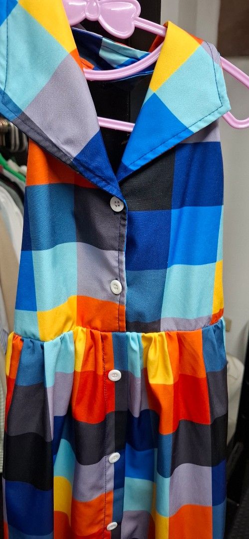 Colorful Plaid Button-Up Shirt Shein (Category: Babies & Kids Fashion) located in Makati City. Submitted by emmanblue (Listing ID 1409012197, Image 3). Description: - Colorful plaid pattern (blue, orange, yellow, gray) - Classic button-up design with collar - sleeveless - Lightweight fabric - White buttons - Tailored fit - Ideal for warmer weather.