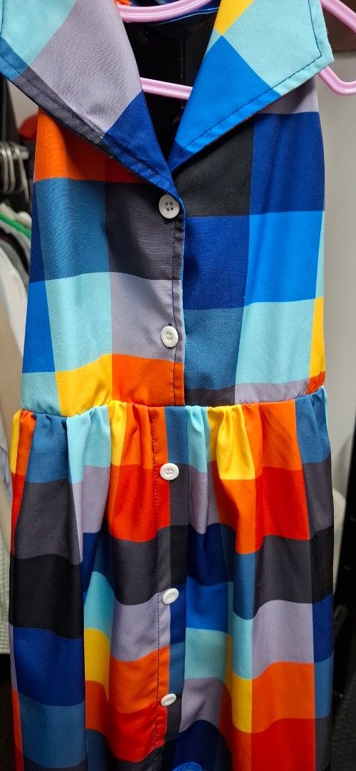 Colorful Plaid Button-Up Shirt Shein (Category: Babies & Kids Fashion) located in Makati City. Submitted by emmanblue (Listing ID 1409012197, Image 2). Description: - Colorful plaid pattern (blue, orange, yellow, gray) - Classic button-up design with collar - sleeveless - Lightweight fabric - White buttons - Tailored fit - Ideal for warmer weather.