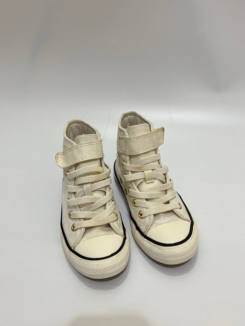 Converse Chuck Taylor All Star High Top Sneakers (Category: Babies & Kids Fashion) located in Bacoor. Submitted by mayasells (Listing ID 1408922786, Image 2). Description: GARAGE SALE! - Converse Chuck Taylor Original - 18CM - Has light discoloration - Color: Offwhite.