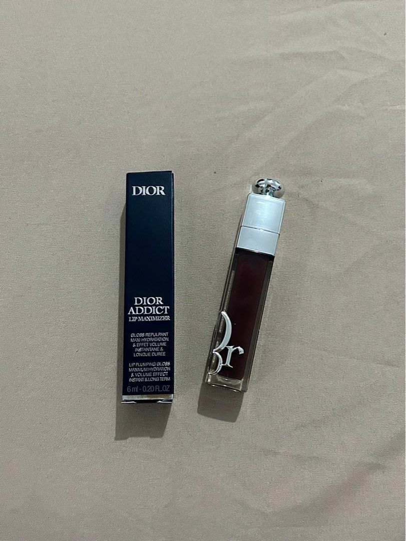 Dior Addict Lip Maximizer (Category: Makeup) located in Porac. Submitted by luvbycass (Listing ID 1408995036, Image 1). Description: - Dior Addict Lip Maximizer in shade 020 (Mahogany) - 100% Authentic (selling low cuz bought it on sale) - Never been used/open - Lip plumping gloss for a volume effect - Includes original box.
