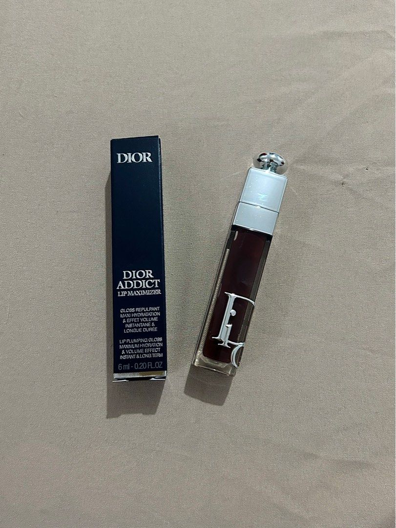 Dior Addict Lip Maximizer (Category: Makeup) located in Porac. Submitted by luvbycass (Listing ID 1408995036, Image 3). Description: - Dior Addict Lip Maximizer in shade 020 (Mahogany) - 100% Authentic (selling low cuz bought it on sale) - Never been used/open - Lip plumping gloss for a volume effect - Includes original box.