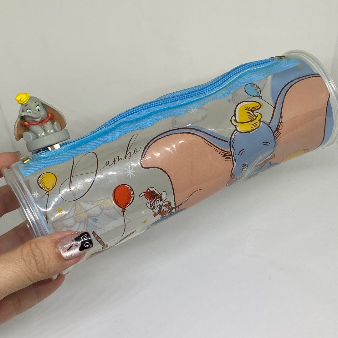 DISNEY DUMBO CLEAR PVC PEN CASE (Category: Stationery & School Supplies) located in Quezon City. Submitted by kitsune.treasures (Listing ID 1408924337, Image 1). Description: *First to pay policy! *1 day reservation only. Failure to pay on time, auto cancel. 📍Quezon City * MOD: J&T | Lalamove * MOP: GCASH | BPI 📦ON HAND AND READY TO SHIP CONDITION: WHAT YOU SEE IS WHAT YOU GET. Dimensions: Kindly check the photos for the actual measurements. Pl