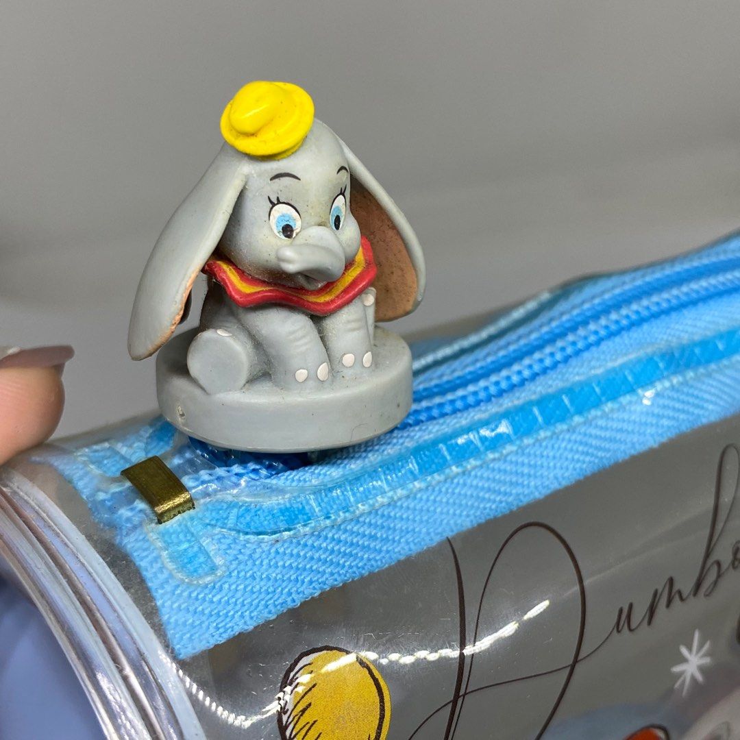 DISNEY DUMBO CLEAR PVC PEN CASE (Category: Stationery & School Supplies) located in Quezon City. Submitted by kitsune.treasures (Listing ID 1408924337, Image 3). Description: *First to pay policy! *1 day reservation only. Failure to pay on time, auto cancel. 📍Quezon City * MOD: J&T | Lalamove * MOP: GCASH | BPI 📦ON HAND AND READY TO SHIP CONDITION: WHAT YOU SEE IS WHAT YOU GET. Dimensions: Kindly check the photos for the actual measurements. Pl