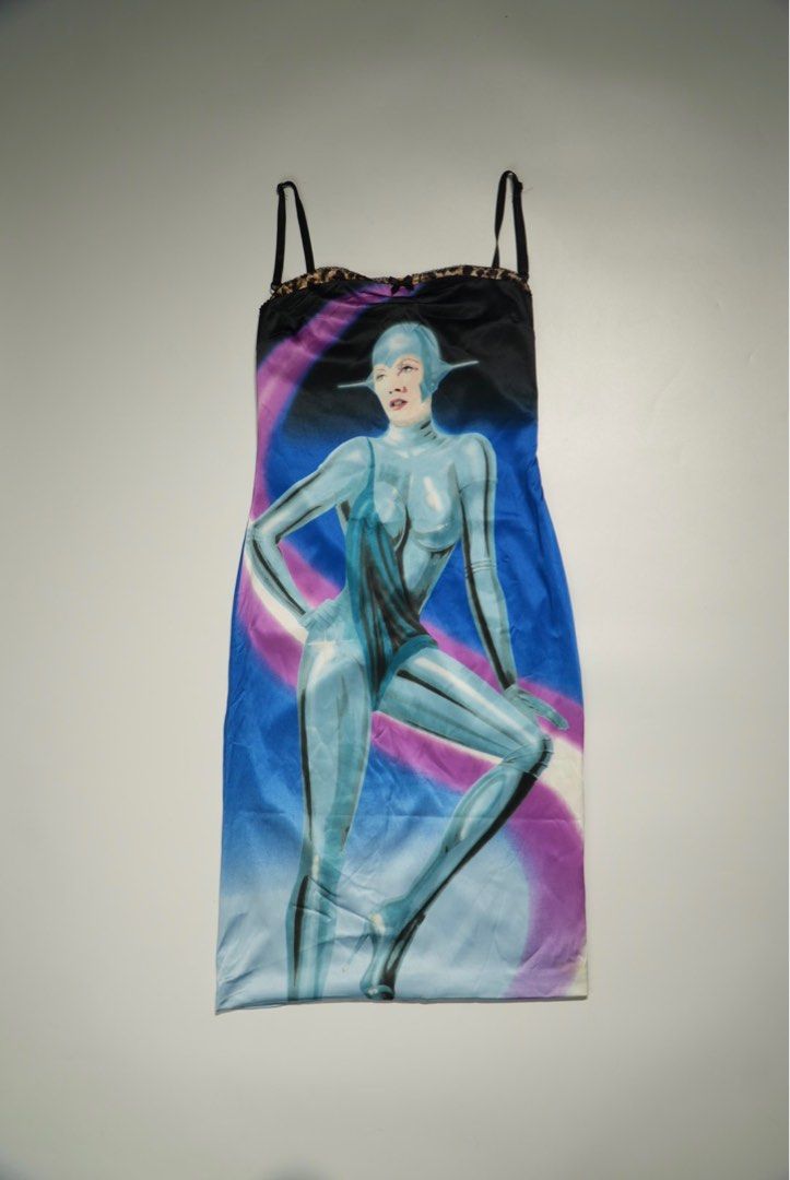 Dolce & Gabbana Printed Dress (Category: Dresses) located in Manila. Submitted by aevan143 (Listing ID 1408934910, Image 1). Description: - Dolce & Gabbana dress - Unique futuristic woman print - Leopard print bustier and straps - Made in Italy - Size 26/40 - Gradient blue and purple back - Zipper closure.