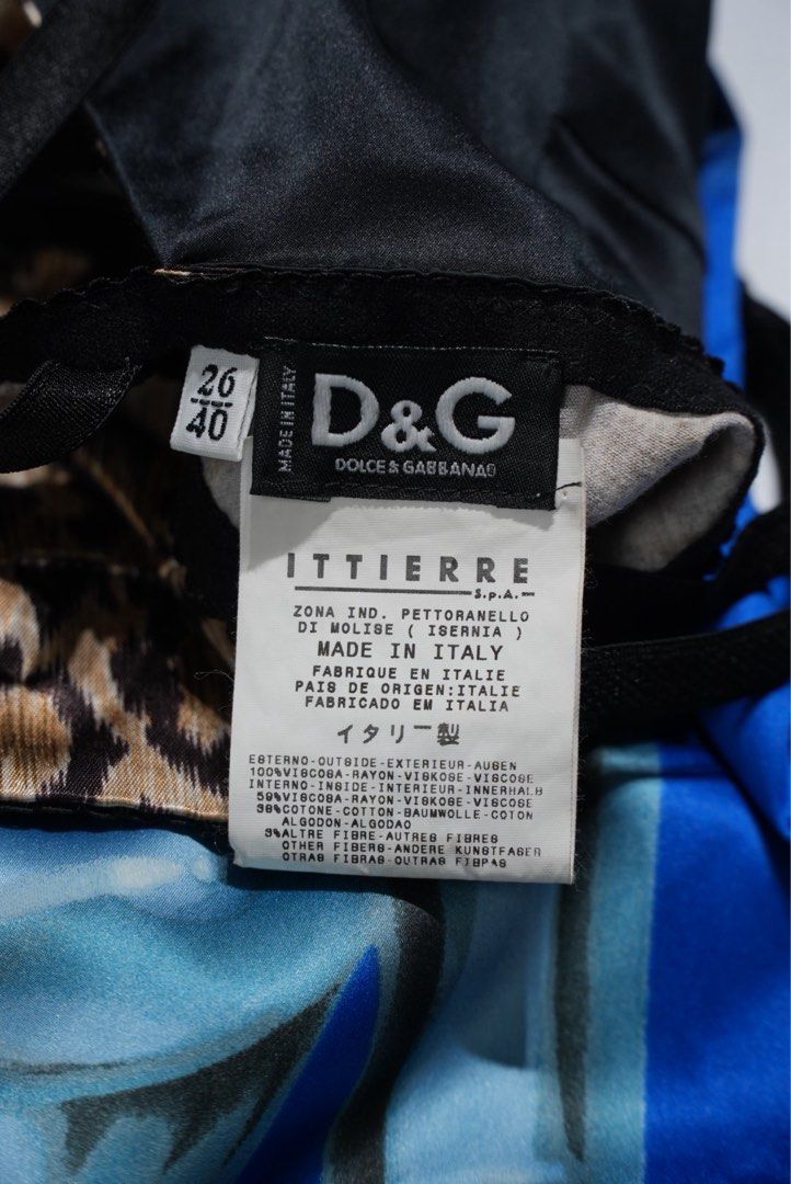 Dolce & Gabbana Printed Dress (Category: Dresses) located in Manila. Submitted by aevan143 (Listing ID 1408934910, Image 3). Description: - Dolce & Gabbana dress - Unique futuristic woman print - Leopard print bustier and straps - Made in Italy - Size 26/40 - Gradient blue and purple back - Zipper closure.