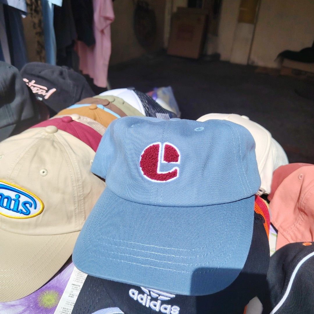 Emis Cap (Category: Caps & Hats) located in Quezon City. Submitted by rvco_stuff (Listing ID 1408922728, Image 1). Description: - Brand: Emis - Color: Light Blue - Logo: Red 'e' - Back Detail: 'E17 24' print - Closure: Adjustable metal clasp with 'emis' logo.