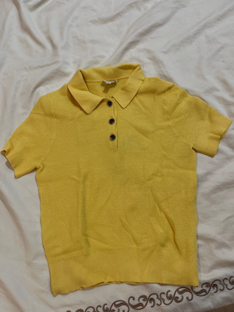 EQ:IQ Yellow Polo Shirt (Category: Shirts) located in Quezon City. Submitted by metric18 (Listing ID 1408894878, Image 1). Description: - EQ:IQ yellow polo shirt - Size: S - Features a collared neckline - Short sleeves - Three-button front - Material: Knitted - Bright yellow color - Ideal for casual outfits.