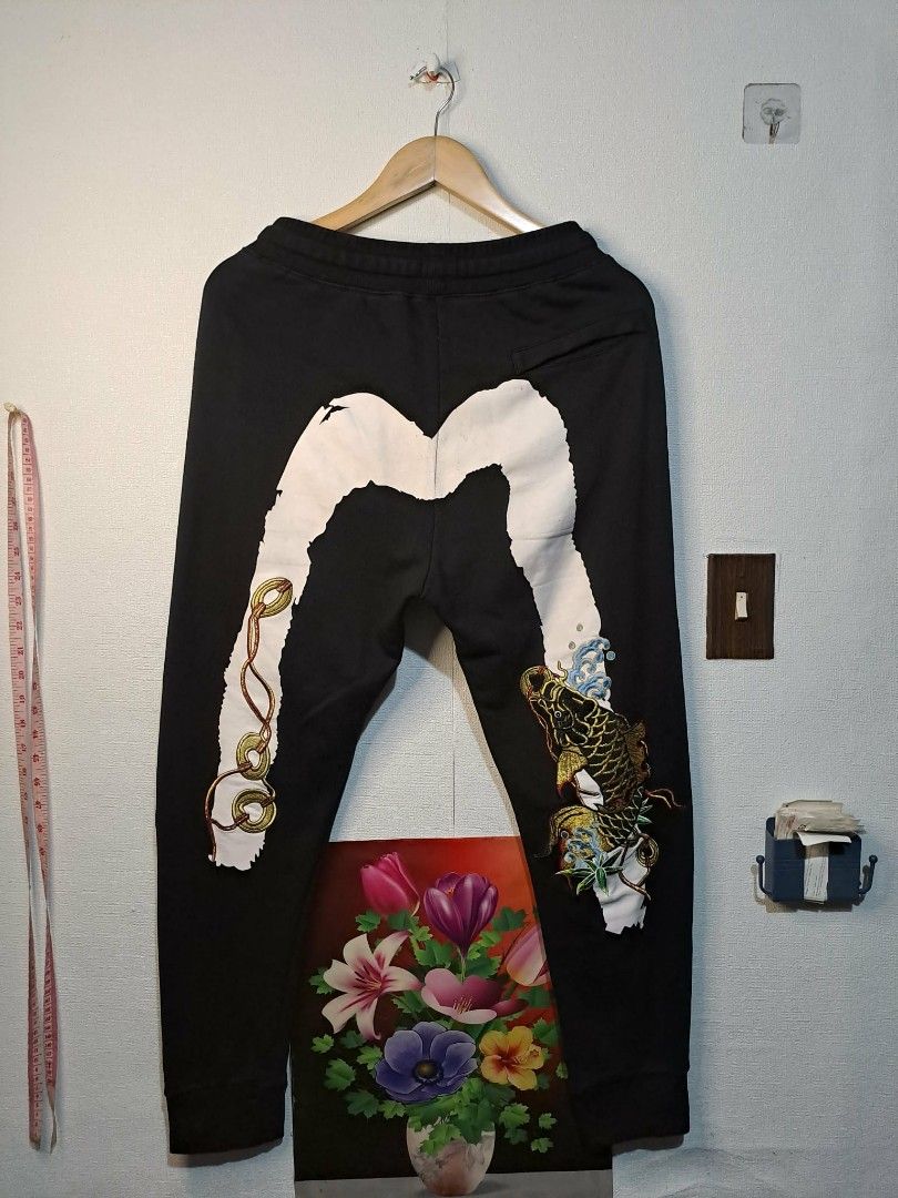 Evisu Daicock Koi Black Sweatpants (Category: Joggers) located in Quezon City. Submitted by yaseen73 (Listing ID 1408929744, Image 1). Description: Authentic Evisu Daicock Embroidery Koi Fish Hard Print Logo Design Size M on Tag 100% Cotton 🔥🔥🔥🔥Japanese Brand🔥🔥🔥🔥 Actual Waistline: 32/33 x Length 25 Color Rate : 9.8/10 Washed Already With Minor Sign of Usage ✓ No Hairlines/No Crack Prints Condition : 9.9/10 or Best Offer J&T 🚛 Lalamove 🛵