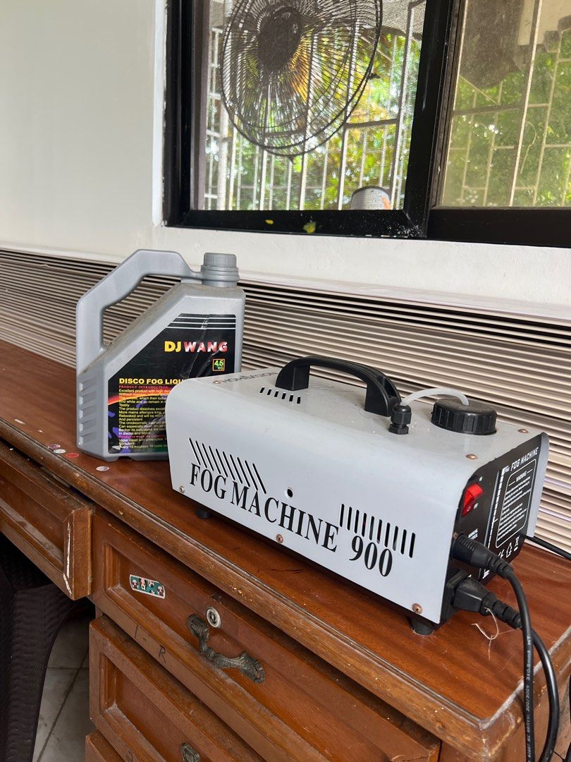 Fog Machine 900w with DJ Wang Fog Liquid (Category: Everything Else Others) located in Valenzuela. Submitted by sords (Listing ID 1408930034, Image 1). Description: - Fog Machine 900 included - Comes with DJ Wang Disco Fog Liquid - Features: - Power switch - Black handle - Black nozzle - Power cord - Perfect for parties and events!.