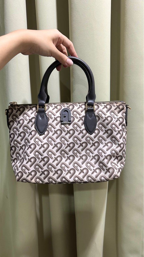 Furla Mini Tote Bag (Category: Tote Bags) located in Cebu City. Submitted by cmy___ (Listing ID 1408929260, Image 1). Description: Got this as a gift from my aunt years ago, used once only, in great condition, retails for P15k + > 9/10 condition > with strap .