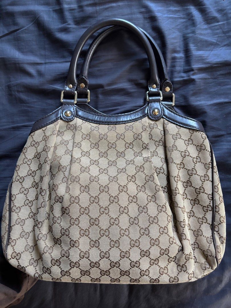 Gucci Sukey Tote (Medium) (Category: Luxury Bags & Wallets) located in Los Banos. Submitted by declutterlistt (Listing ID 1408898652, Image 2). Description: Selling my mom’s old bag. - Authentic - GG canvas - Leather handles and trim - Interior pocket - Includes dust bag and Gucci charm - Original receipt included Seller is based in Laguna and meetups will be in January 2 to 3 in MOA. .