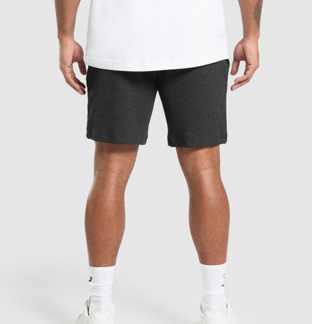 Gymshark Charcoal Grey Shorts (Category: Activewear) located in Cavite. Submitted by bsmallari (Listing ID 1409026854, Image 1). Description: Gymshark charcoal grey ribbed shorts. Features drawstring, zippered pocket, and embroidered logo. Comfortable fit for workouts or casual wear. Brand New Size M - Oversize Fit.