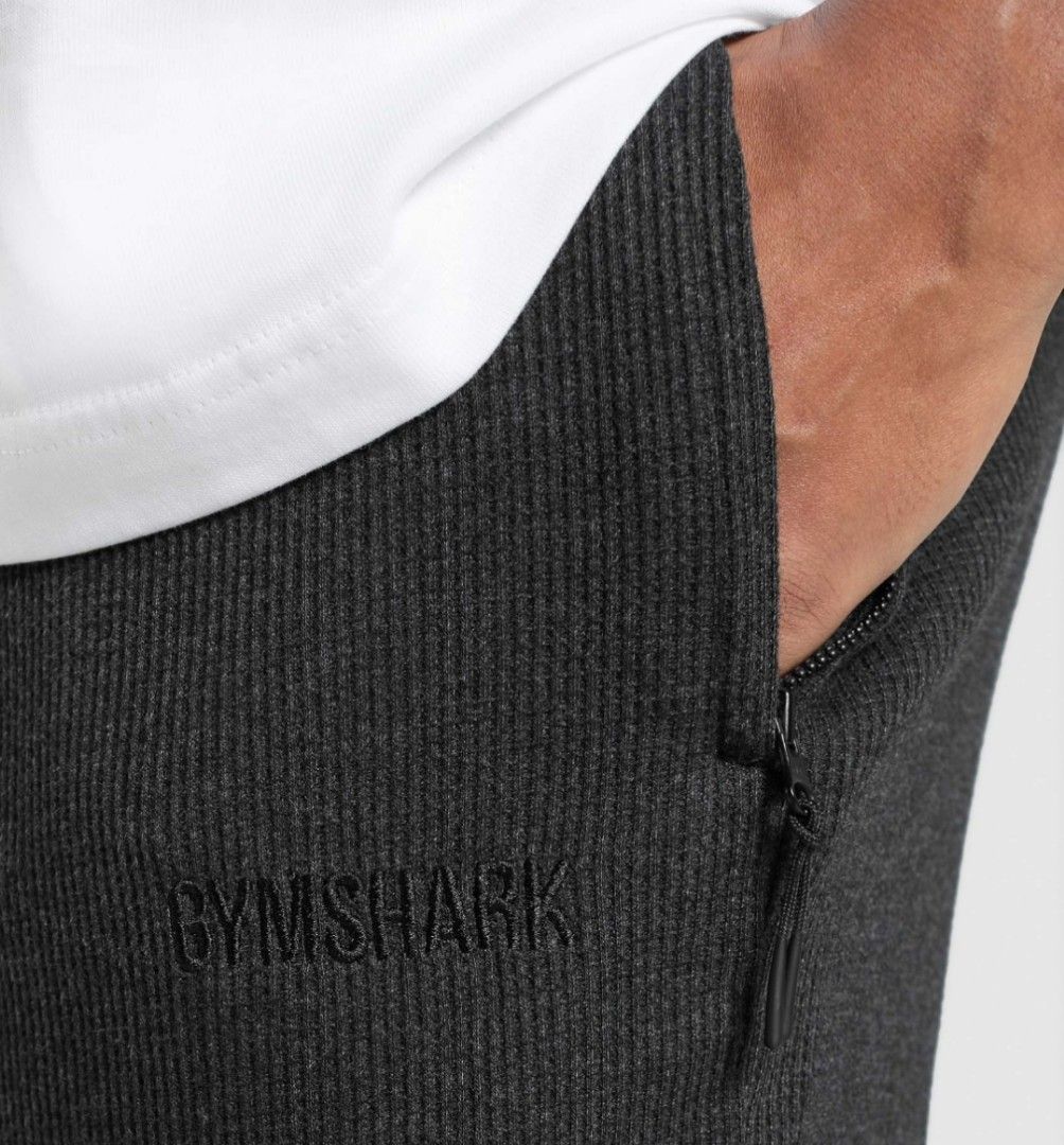 Gymshark Charcoal Grey Shorts (Category: Activewear) located in Cavite. Submitted by bsmallari (Listing ID 1409026854, Image 2). Description: Gymshark charcoal grey ribbed shorts. Features drawstring, zippered pocket, and embroidered logo. Comfortable fit for workouts or casual wear. Brand New Size M - Oversize Fit.