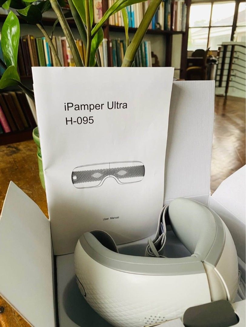 Hiro iPamper Ultra H-095 Eye Massager (Category: Massage Devices) located in Quezon City. Submitted by alexora (Listing ID 1409005635, Image 1). Description: - iPamper Ultra H-095 Eye Massager - Features: Air pressure, heating, and Bluetooth music - Design: Foldable and made with high-end protein leather - Power: 5V-1A (USB), 5W power consumption - Timer: 15-minute auto shut-off - Dimensions: 211x148x94mm - Weight: 302g.