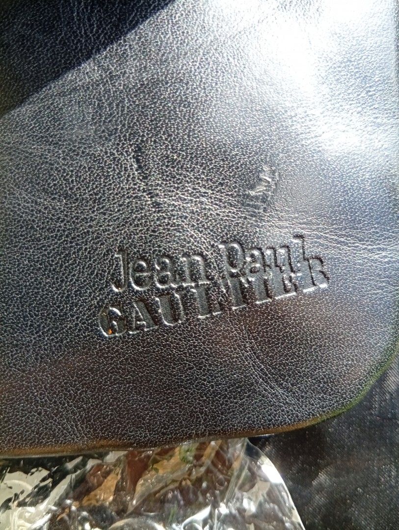 Jean Paul Gaultier Black Chain Bag (Category: Luxury Bags & Wallets) located in Cabadbaran. Submitted by lagiuminomtubig1 (Listing ID 1408892899, Image 3). Description: - Authentic Jean Paul Gaultier bag - Black color - Chain strap (silver-toned) - Lock closure with key charm - Jean Paul Gaultier logo embossed - Includes dust bag - Small size, ideal for essentials.