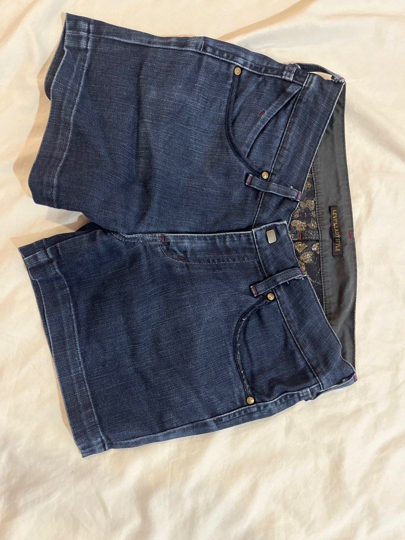 Levi's Lady Style Denim Shorts (Category: Shorts) located in Quezon City. Submitted by metric18 (Listing ID 1408895118, Image 1). Description: - Levi's Lady Style denim shorts - Dark wash - Classic five-pocket design - Button and zipper closure - Unique floral pattern on inner lining - Distinctive curved back pocket design - Made of durable denim - premium denim, looks new.