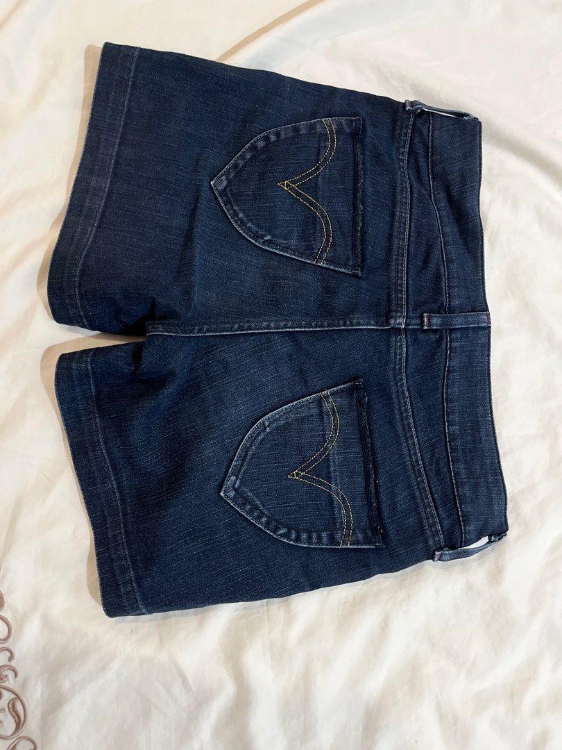 Levi's Lady Style Denim Shorts (Category: Shorts) located in Quezon City. Submitted by metric18 (Listing ID 1408895118, Image 2). Description: - Levi's Lady Style denim shorts - Dark wash - Classic five-pocket design - Button and zipper closure - Unique floral pattern on inner lining - Distinctive curved back pocket design - Made of durable denim - premium denim, looks new.