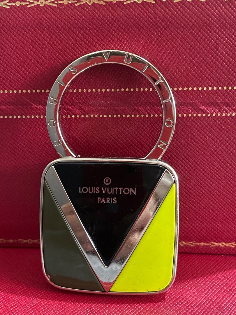 LV Key Holder/Bag Charm (Category: Luxury Accessories) located in Quezon City. Submitted by liezl.marie (Listing ID 1409019668, Image 1). Description: L.0u!s V. Key Ring/Bag Charm in black, green & yellow with silver hardware. 7,800 Open for layaway. Disclaimer: We are not affiliated, associated, authorized, endorsed by or in any way officially connected with any other company or luxury brand. All copyrights are reserved to the original brand..