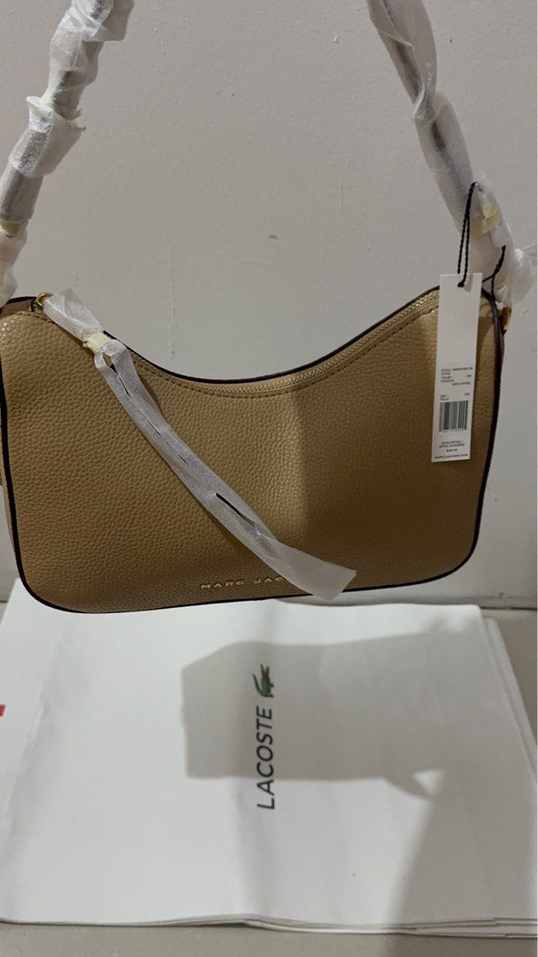 Marc Jacobs Drifter Large - Ice Coffee (Category: Luxury Bags & Wallets) located in Quezon City. Submitted by branded_jo (Listing ID 1408894040, Image 3). Description: Original Marc Jacobs Drifter Large Ice coffee Brand new with tag and paper Bag Lalamove Ready Bought in US.