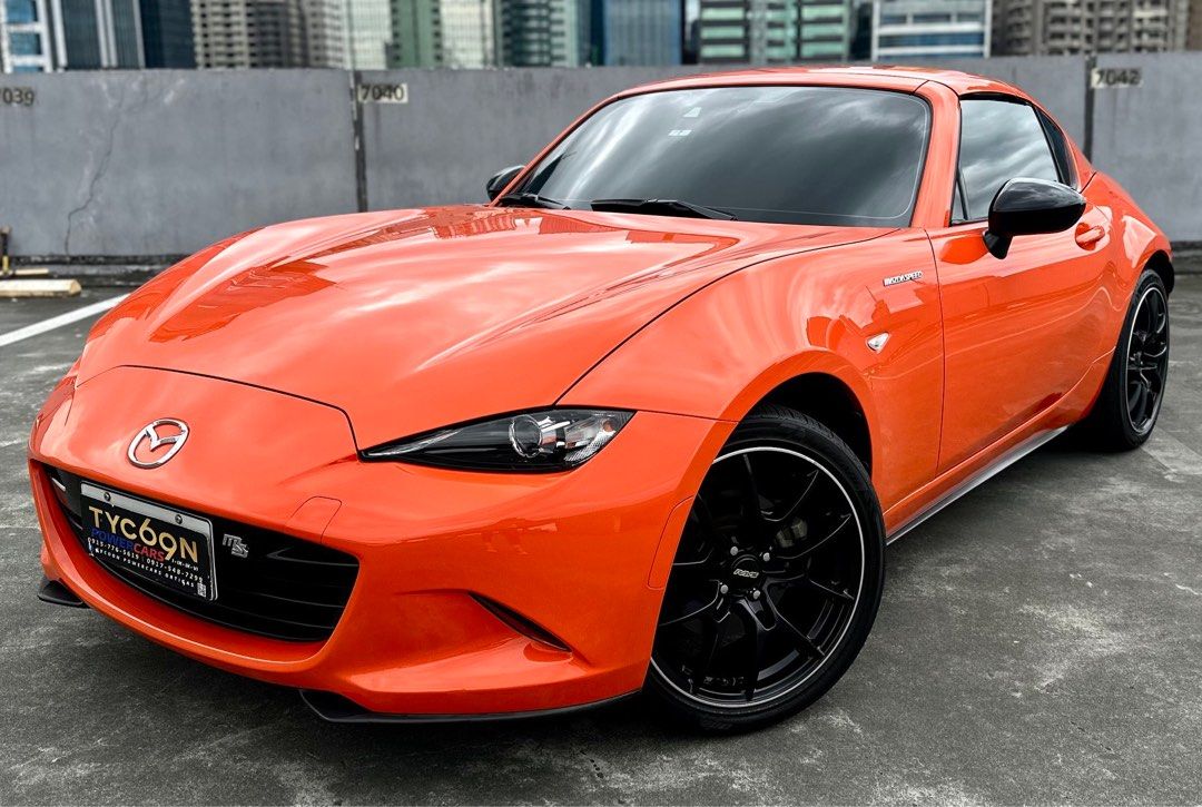 Mazda MX-5 30th Anniversary Edition Auto (Category: New Cars) located in Pasig City. Submitted by tycoon.cars (Listing ID 1408959470, Image 1). Description: MAZDA MX-5 MIATA - 2018 Model - 20,XXX Original Mileage - 30th Anniversary Edition - Full Option - Top of the Line - Hardtop Convertible - Sunkist Orange (Rare Color) - RAYS Volk Racing G025 with New Tires - No Issues We Don’t Sell Cars, We Sell Dreams. BUY•SELL•TRADE•CONSIGN•FINANCING Tycoon