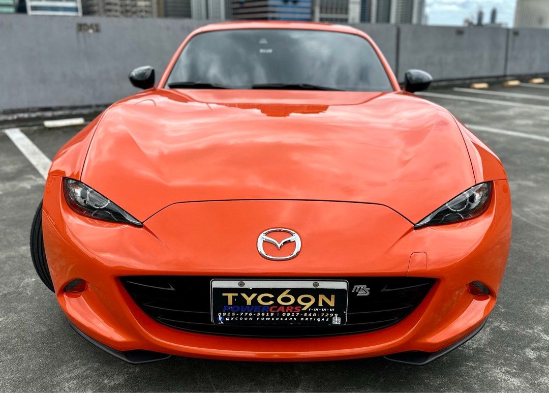 Mazda MX-5 30th Anniversary Edition Auto (Category: New Cars) located in Pasig City. Submitted by tycoon.cars (Listing ID 1408959470, Image 2). Description: MAZDA MX-5 MIATA - 2018 Model - 20,XXX Original Mileage - 30th Anniversary Edition - Full Option - Top of the Line - Hardtop Convertible - Sunkist Orange (Rare Color) - RAYS Volk Racing G025 with New Tires - No Issues We Don’t Sell Cars, We Sell Dreams. BUY•SELL•TRADE•CONSIGN•FINANCING Tycoon