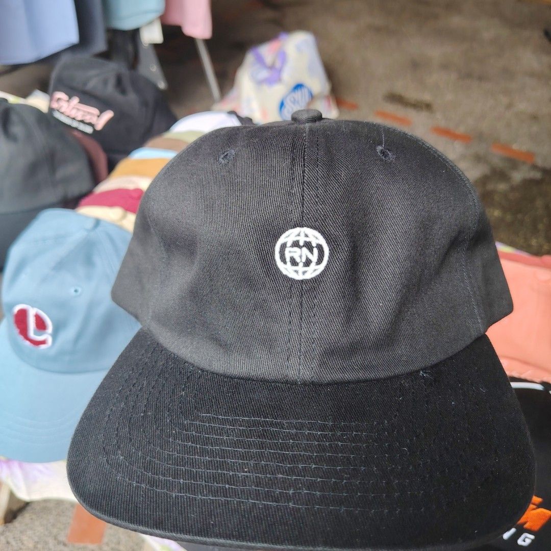 Nature Black Cap (Category: Caps & Hats) located in Quezon City. Submitted by rvco_stuff (Listing ID 1408923248, Image 1). Description: - Black cap with a stylish globe logo. - Features an adjustable strap for a comfortable fit. - Made from durable fabric, built to last. - Brand tag: Nature. - Ideal for daily use..