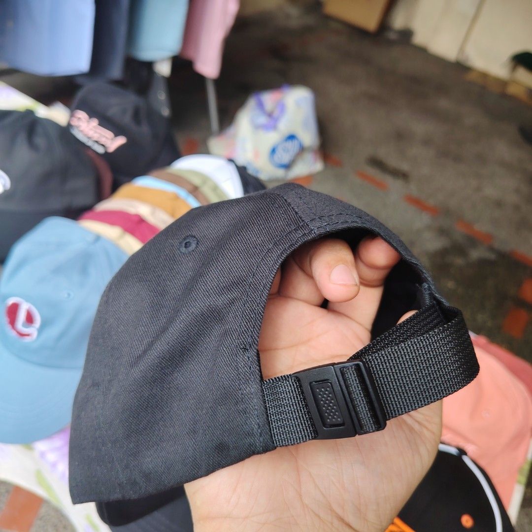 Nature Black Cap (Category: Caps & Hats) located in Quezon City. Submitted by rvco_stuff (Listing ID 1408923248, Image 2). Description: - Black cap with a stylish globe logo. - Features an adjustable strap for a comfortable fit. - Made from durable fabric, built to last. - Brand tag: Nature. - Ideal for daily use..
