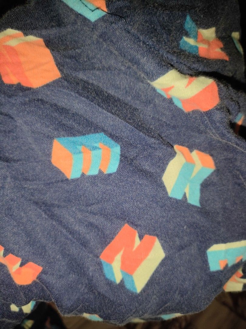 Nike Baby Onesie 6M (Category: Babies & Kids Fashion) located in Guagua. Submitted by peachline (Listing ID 1408928529, Image 3). Description: - Navy blue Nike baby onesie - Colorful geometric pattern - Size: 6 months (62-68cm) - Full-length zipper - Footed design - Made in Vietnam - Nike logo on collar.