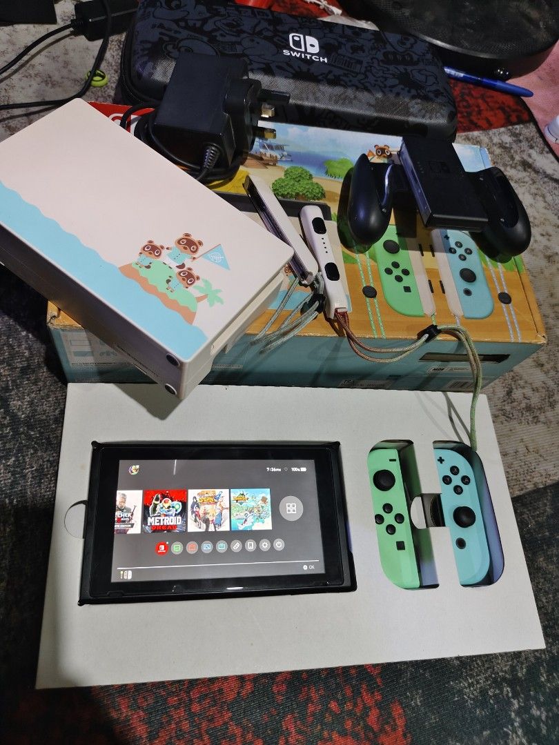 Nintendo Switch Console with Joy-Cons (Category: Nintendo) located in Binan City. Submitted by olxph_401981327 (Listing ID 1408999178, Image 2). Description: For Sale or Swap! Nintendo Switch v2 Animal Crossing Edition with: Box JoyCons HDMi Charger Dock Grip Straps 512gb SD Card full of games na.. 11k lastprice 12k pag makulit ka...