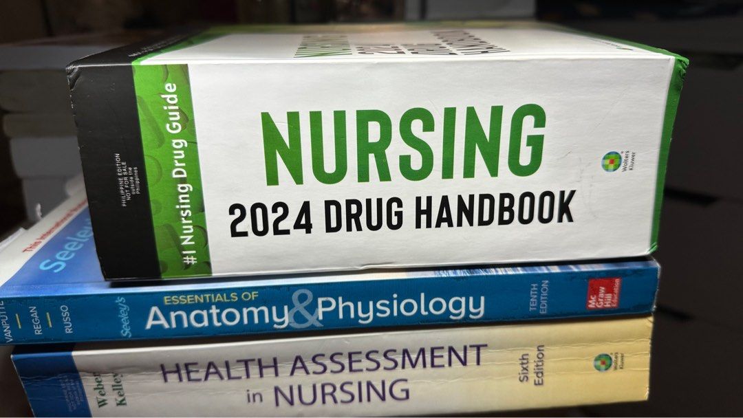 Nursing Books (Category: Textbooks) located in Taguig. Submitted by hapipeachy (Listing ID 1408935039, Image 2). Description: Most of the books are unused. Message for the condition of the book.