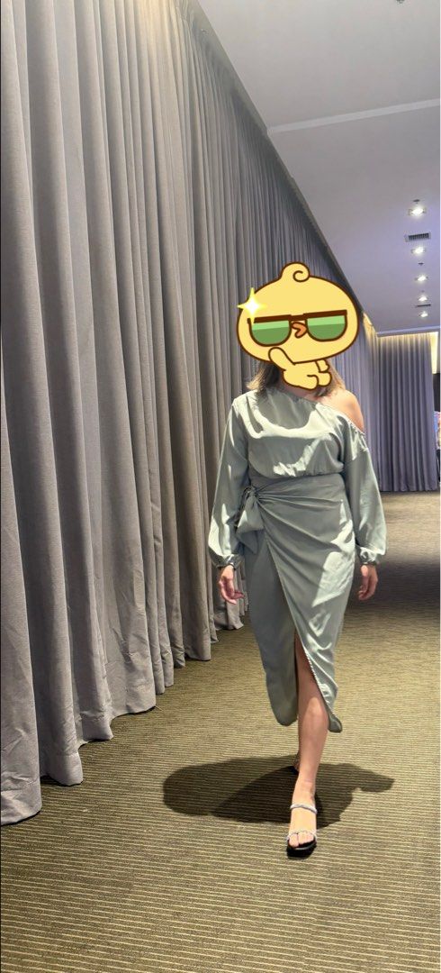 Sage Green One-Shoulder Midi Dress (Category: Dresses) located in Manila. Submitted by lhen0613 (Listing ID 1409024289, Image 1). Description: - Sage green midi dress - Asymmetrical one-shoulder design - Draped sleeve detail - Wrap-style skirt with side tie - Midi length - Suitable for special occasions and evening events - Subtle sheen fabric.