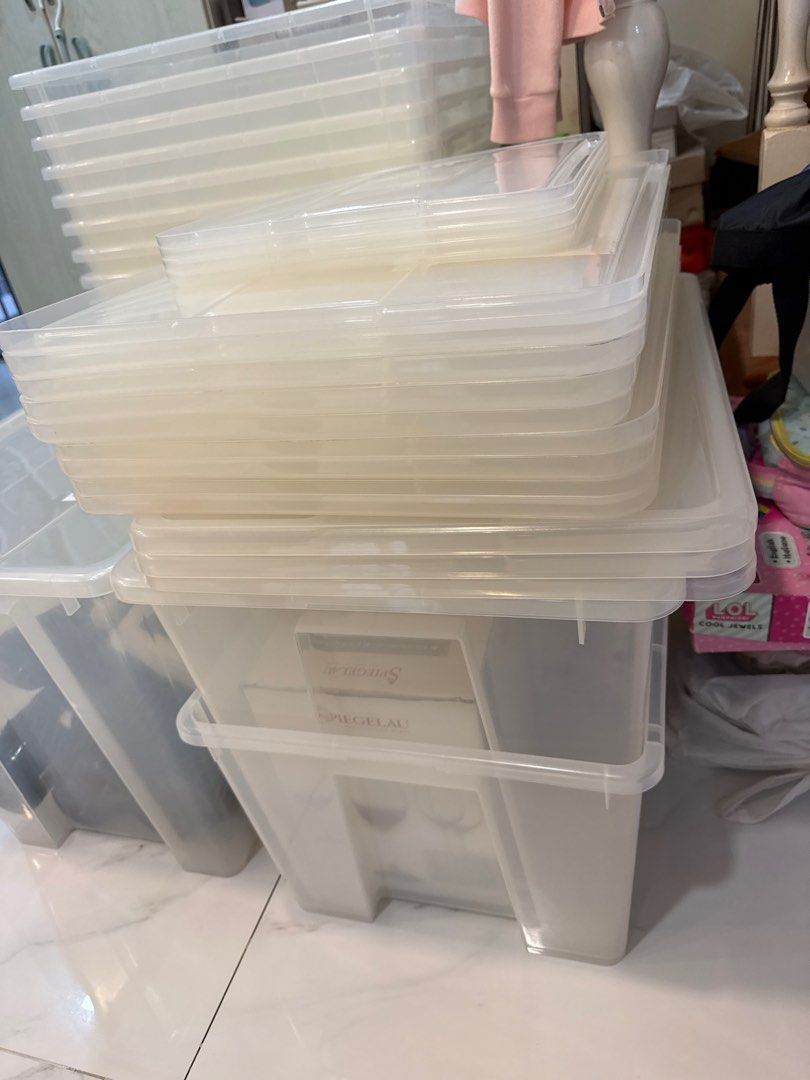 Stackable Clear Plastic Storage Boxes (Category: Storage Boxes & Baskets) located in Singapore. Submitted by Evelynngsl (Listing ID 1408985581, Image 2). Description: Set of stackable clear plastic storage boxes. Great for organizing and decluttering your home or office. Durable and easy to clean. Perfect for storing clothes, toys, or other items. Includes the lids/covers. Each box is $8..