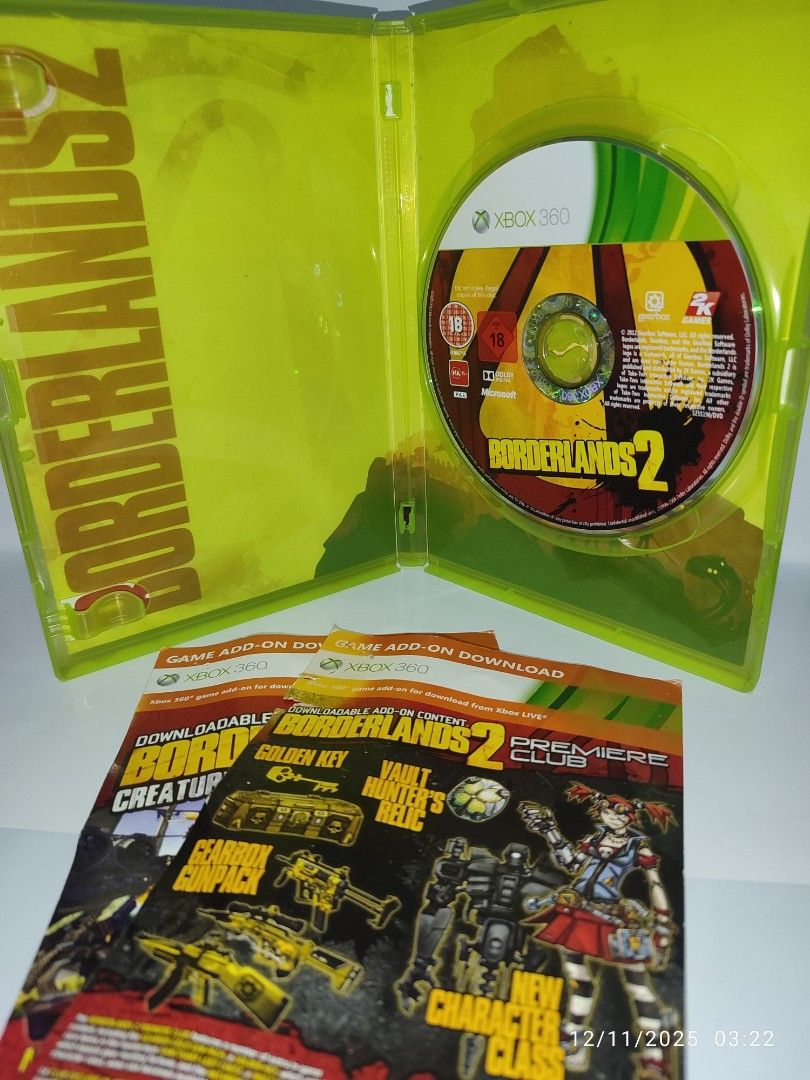 XBOX 360 - Borderlands 2 ((PRE-OWNED) "OPEN REGION" (Category: Xbox) located in Mendez-Nunez. Submitted by sf2_gameshop (Listing ID 1409061164, Image 2). Description: PLEASE READ: Plays on any Xbox 360 unit, regardless of region. Works on: PAL - √ (YES) NTSC/J - √ (YES) NTSC - √ (YES) CONDITION: A used item. The disc has scratches but they do not affect the gameplay. Tested working. The case has line cracks (pls. refer to posted photos.). GENRE: 