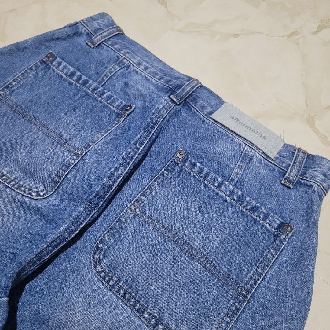 Aftermaths Heritage and Innovation Denim (Category: Jeans) located in Quezon City. Submitted by eivan____orong (Listing ID 1409130272, Image 3). Description: - Aftermaths blue jeans - Size: Small - Features: - Button closure - Two front pockets - Unique paneling design - Fit: Straight leg - Back pockets: Square Dimes: waist 30 thigh 13 length 37 leg opening 7 .