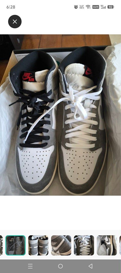 Air Jordan 1 High OG Smoke Grey (Category: Sneakers) located in Quezon City. Submitted by cluttercures (Listing ID 1409164045, Image 1). Description: - Air Jordan 1 High OG 'Smoke Grey' - White and grey upper - Black accents - Comes with black and white laces - Nike Air logo on the tongue.