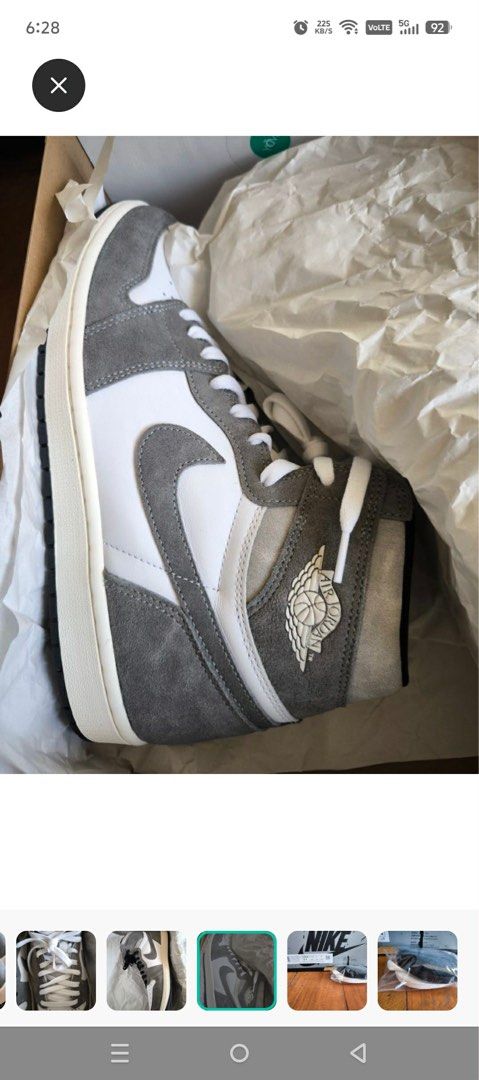 Air Jordan 1 High OG Smoke Grey (Category: Sneakers) located in Quezon City. Submitted by cluttercures (Listing ID 1409164045, Image 3). Description: - Air Jordan 1 High OG 'Smoke Grey' - White and grey upper - Black accents - Comes with black and white laces - Nike Air logo on the tongue.
