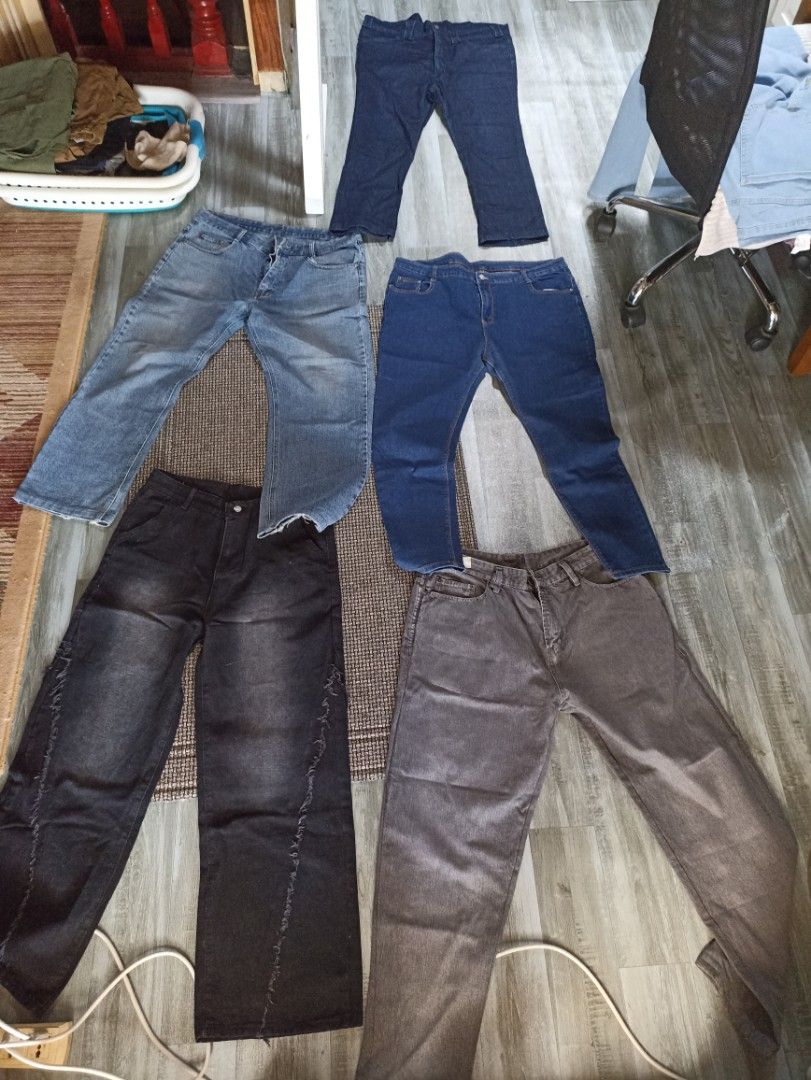 Assorted Jeans - Various Sizes and Colors (Category: Jeans) located in Las Pinas. Submitted by declutterdownsize (Listing ID 1409109536, Image 1). Description: - Assorted jeans collection - Colors: Blue, black, and gray - Styles: Straight-leg and relaxed fit - Suitable for everyday wear - Sizes may vary size 37 to 39 take all.