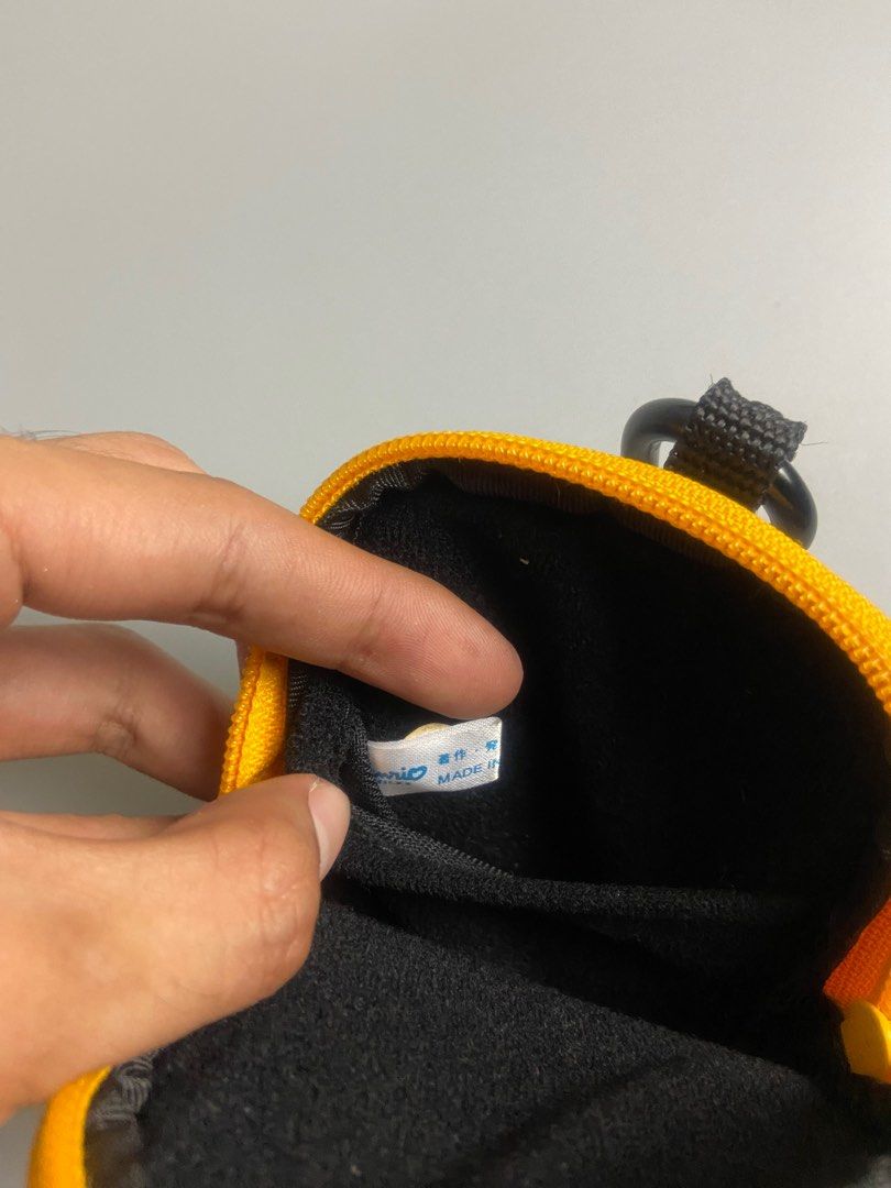 baby milo (Category: Purses & Pouches) located in San Fernando. Submitted by dippedrops (Listing ID 1409161532, Image 3). Description: baby milo keychain pouch excellent condition no issue.
