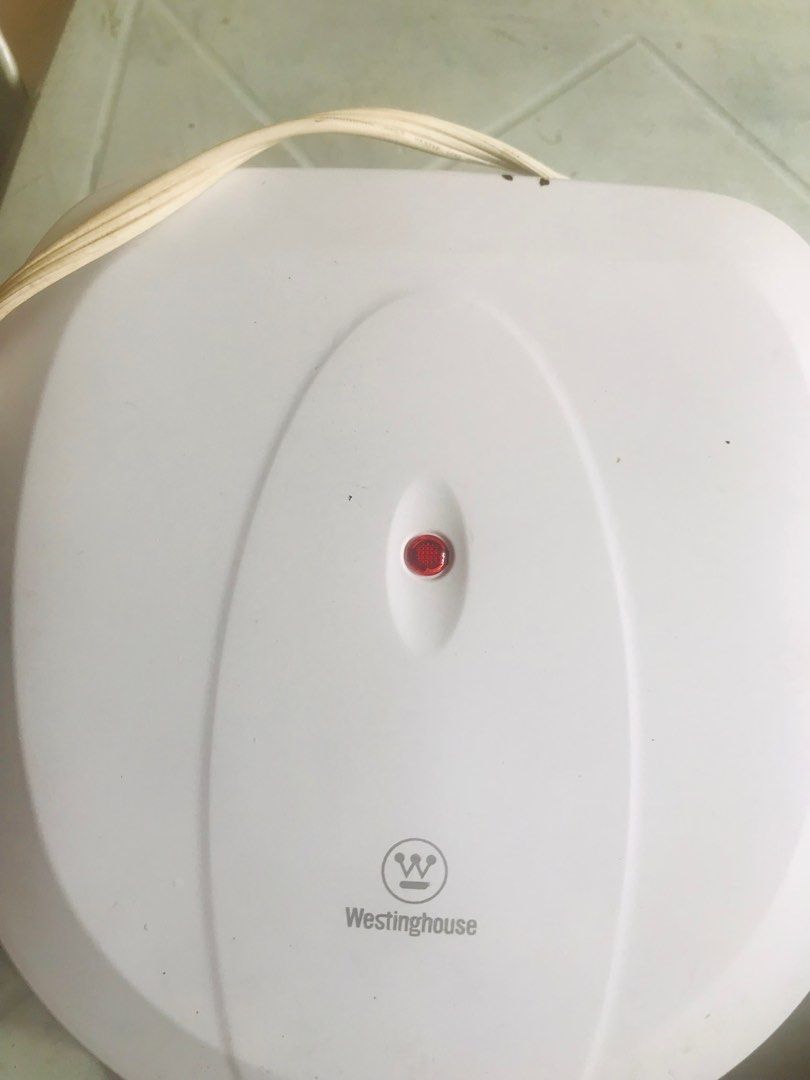 Bread toaster westinghouse (Category: Breadmakers) located in Marikina City. Submitted by jennyfromtheblock15 (Listing ID 1409080730, Image 3). Description: Used westinghouse sandwich maker. with scratches inside but still working great. sf c/obuyer marikina heights area.