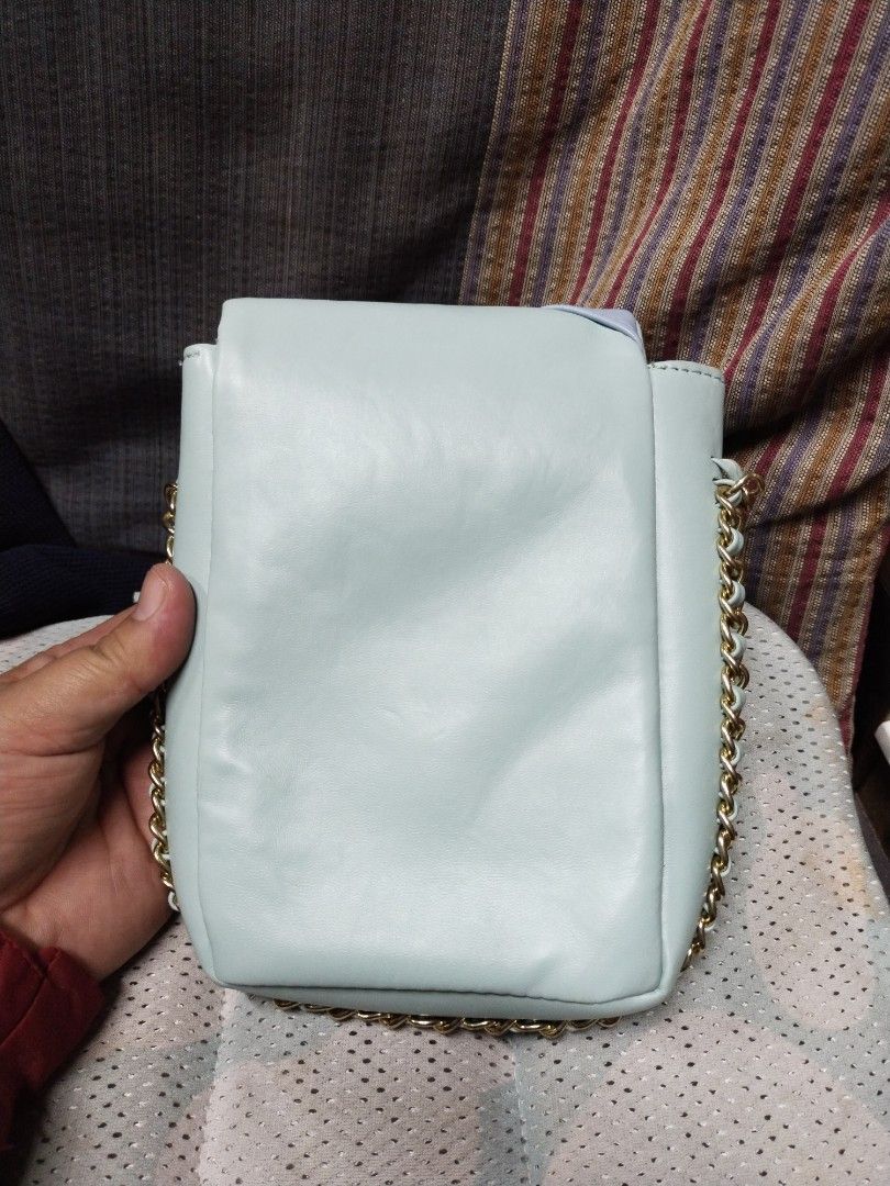 chanel cp sling (Category: Luxury Bags & Wallets) located in Baguio. Submitted by roozeydluc (Listing ID 1409203187, Image 3). Description: leather material l:4.4" w:1.5" h:6.5" 🔎may mga light blackish dot size stain sa flap part.sa may color yellow banda. 1 flap & twist lock compartment.