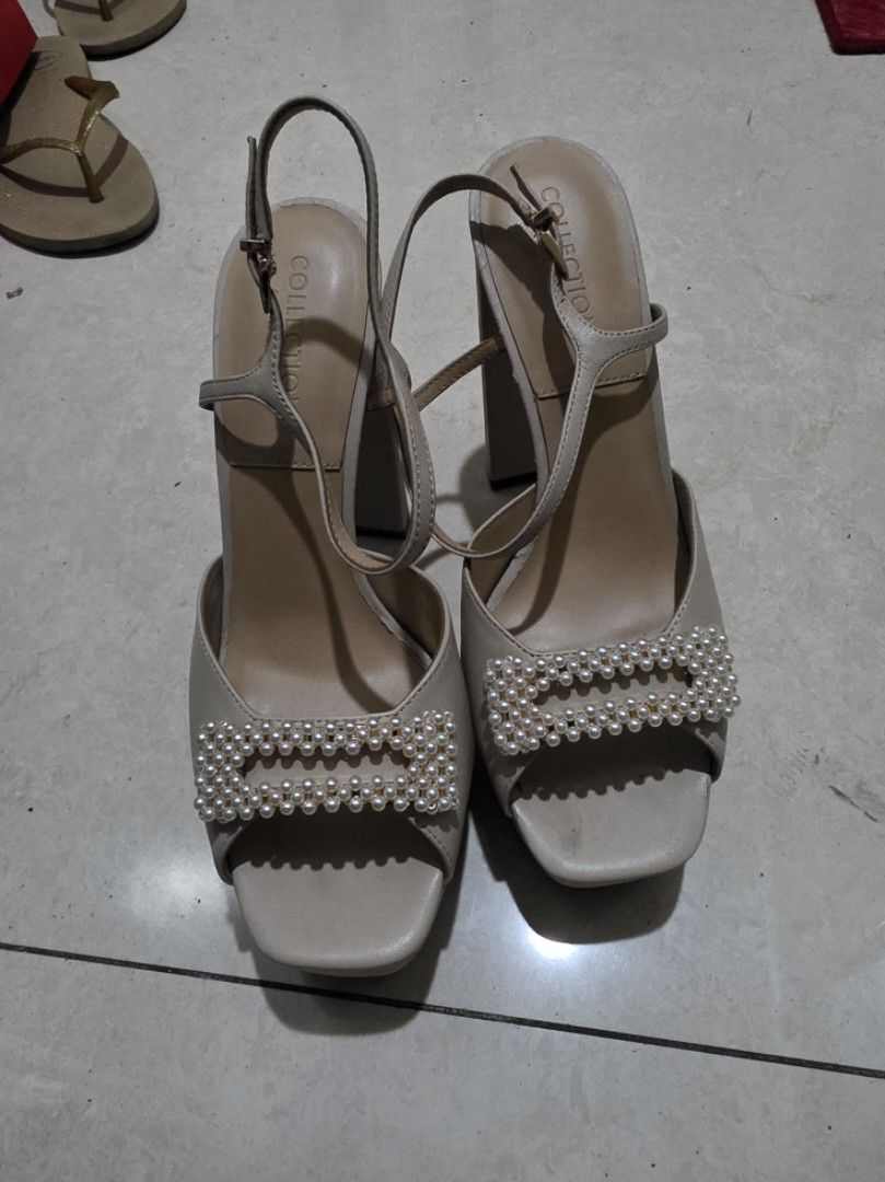 Charles & Keith Pearl Embellished Sandals (Category: Flats & Sandals) located in San Juan City. Submitted by mia.concep (Listing ID 1409243997, Image 1). Description: - Charles & Keith sandals - Beige color - Pearl embellished straps - Block heel - Ankle strap - Brand marked sole - Signs of wear on heels.