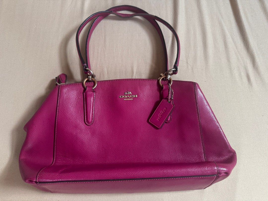 Coach Mine Christie Caryall Satchel (Category: Luxury Bags & Wallets) located in Manila. Submitted by sandi___06 (Listing ID 1409149675, Image 1). Description: Handbag only No strap included With hangtag Flaws seen on picture Authentic Ykk zip Color: Magenta Loc: Pasay City.