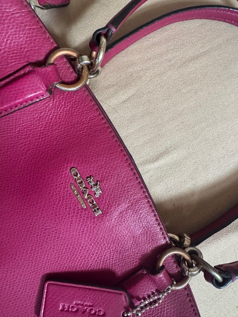 Coach Mine Christie Caryall Satchel (Category: Luxury Bags & Wallets) located in Manila. Submitted by sandi___06 (Listing ID 1409149675, Image 3). Description: Handbag only No strap included With hangtag Flaws seen on picture Authentic Ykk zip Color: Magenta Loc: Pasay City.