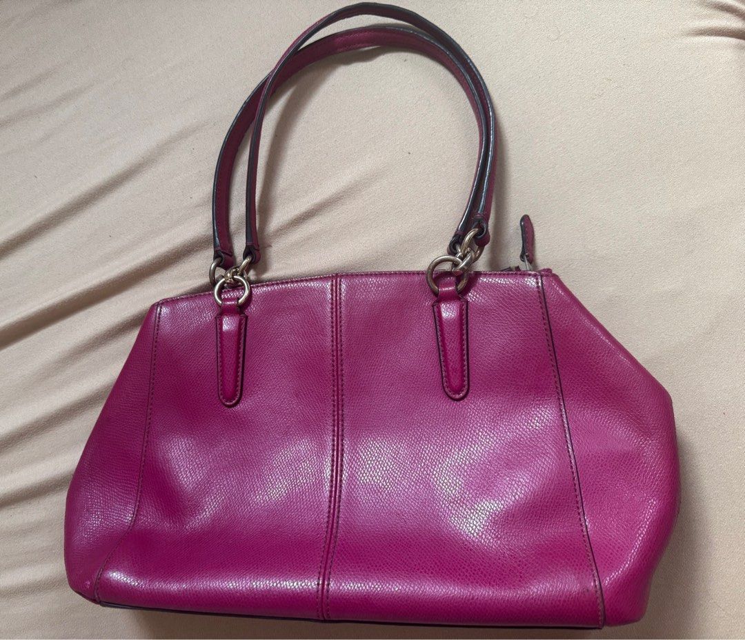 Coach Mine Christie Caryall Satchel (Category: Luxury Bags & Wallets) located in Manila. Submitted by sandi___06 (Listing ID 1409149675, Image 2). Description: Handbag only No strap included With hangtag Flaws seen on picture Authentic Ykk zip Color: Magenta Loc: Pasay City.